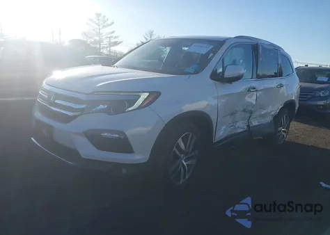 2018 Honda Pilot Touring z USA, uszkodzony, nr VIN 5FNYF6H90JB029797